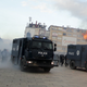 Image for article titled Photos: Protesters in Kosovo have set fire to government headquarters